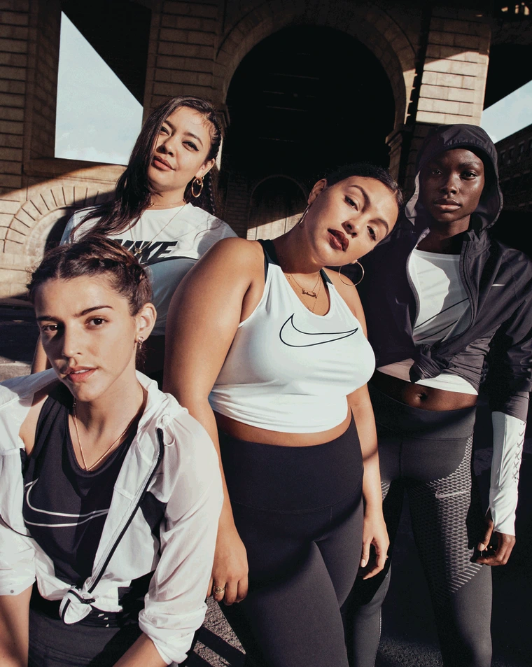 four womwn in nike gym gear